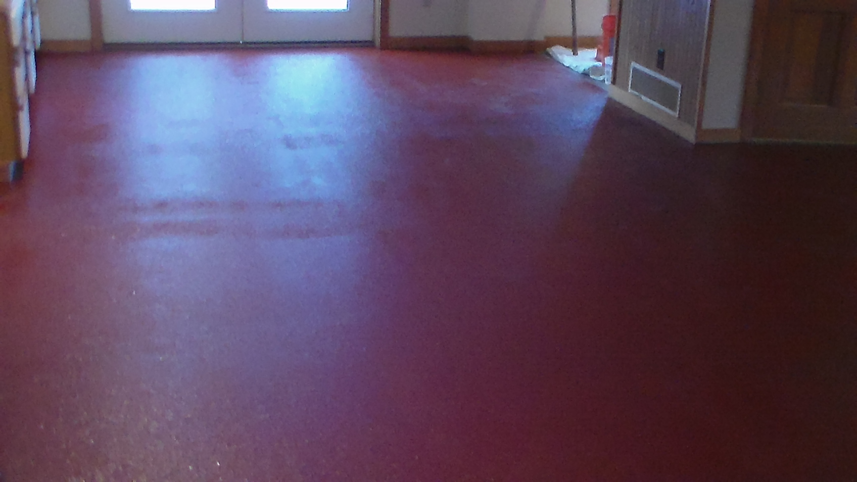Red epoxy paint chip floor in basement.